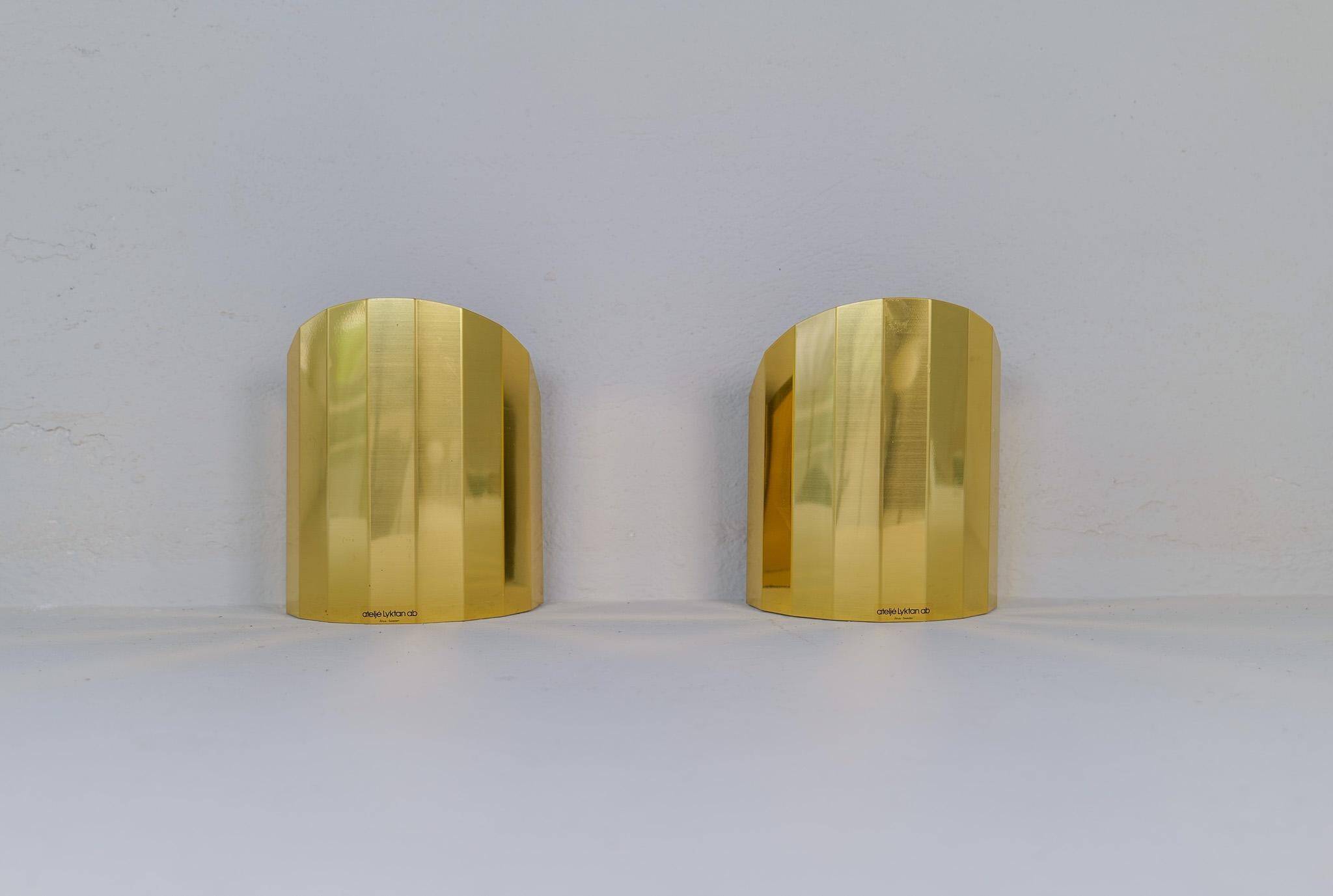 Pair of brass wall sconces in mid-century style Atelje Lyktan Sweden 1970s