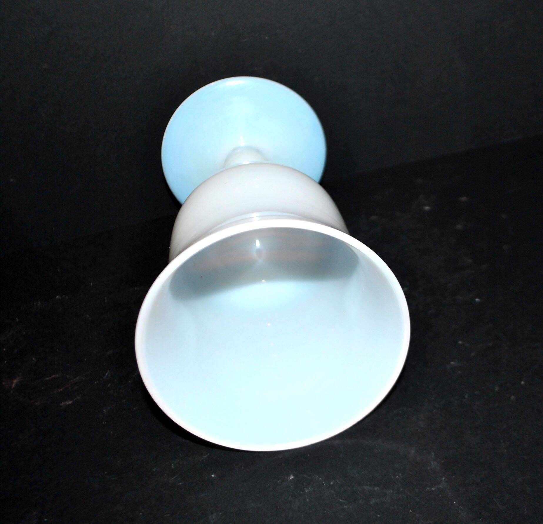 Ancient opaline white glass goblet with a soap bubble effect.