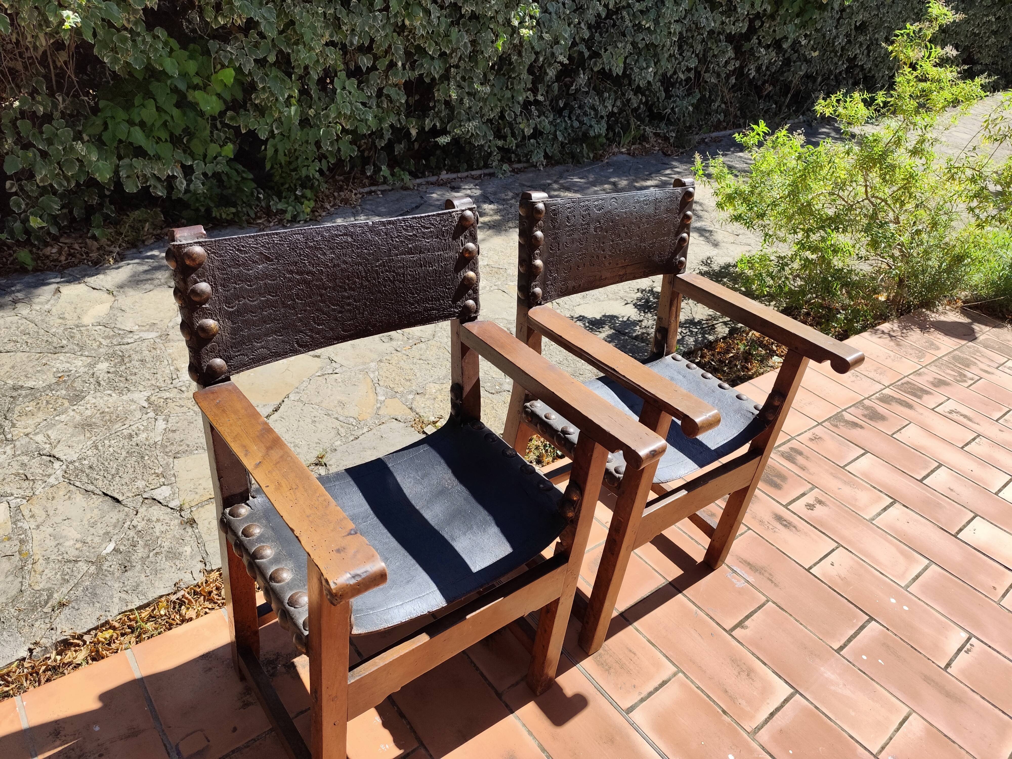 Pair of French Brutalist oak and leather armchairs 1920