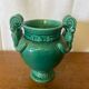 Antique green ceramic vase with handles