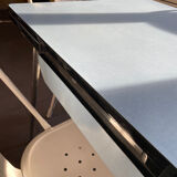 Blue Formica table for 4 to 6 people