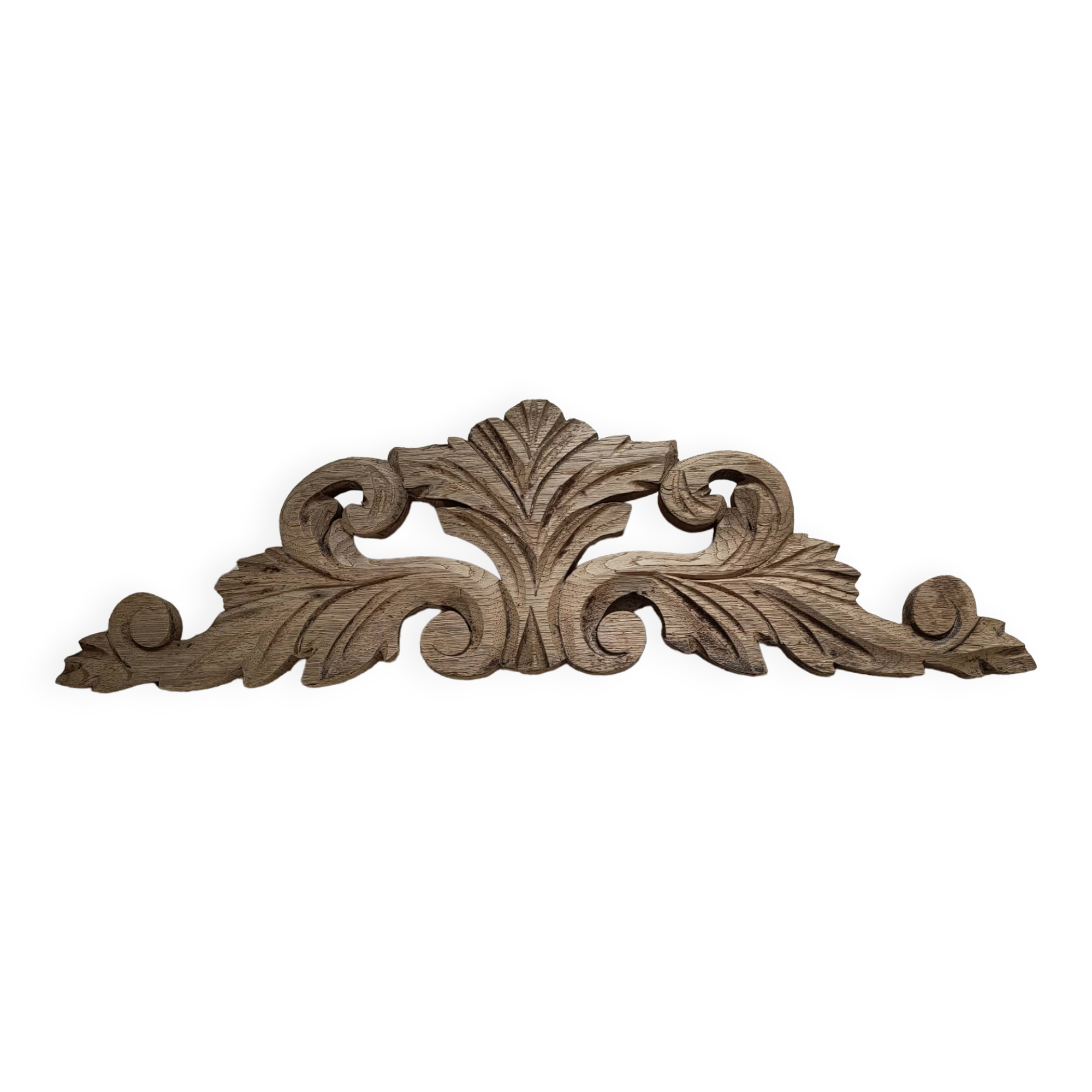Old pediment in cut wood