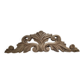 Old pediment in cut wood