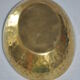 Empty hammered brass pocket