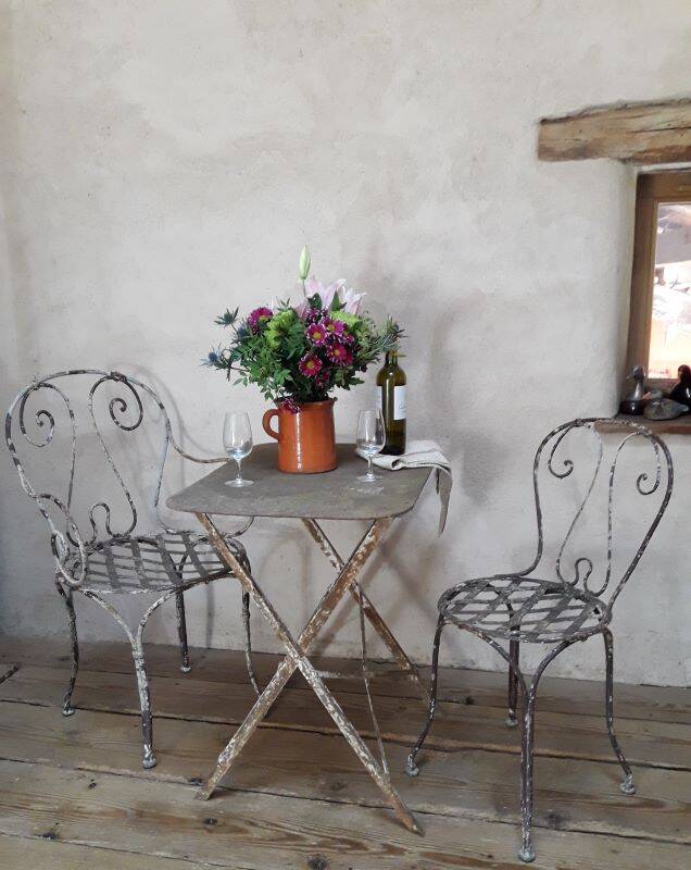19th-century garden armchair in wrought iron