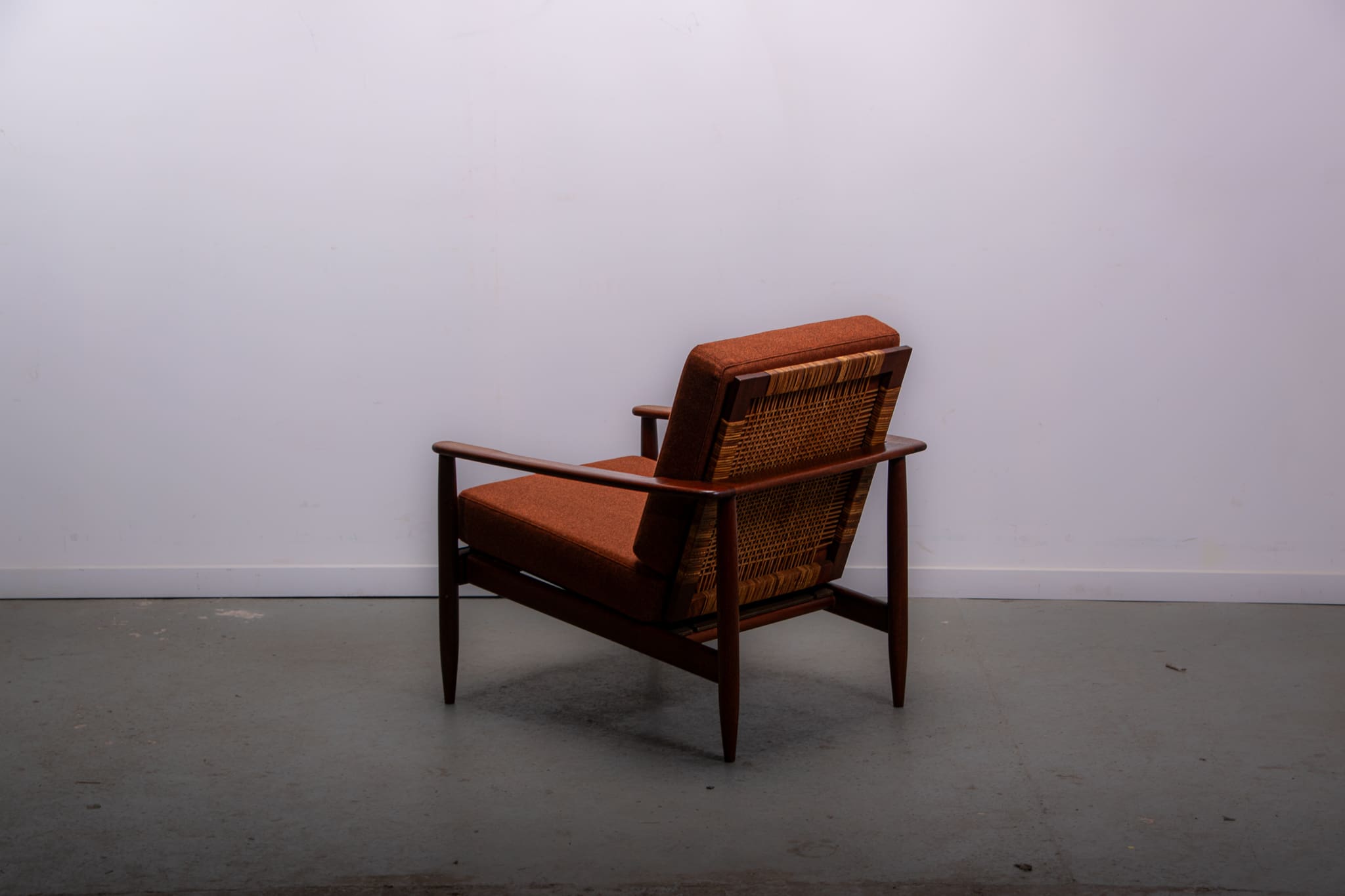 Mid-century easy chair in teak and cane circa 1970