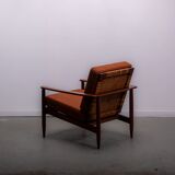 Mid-century easy chair in teak and cane circa 1970