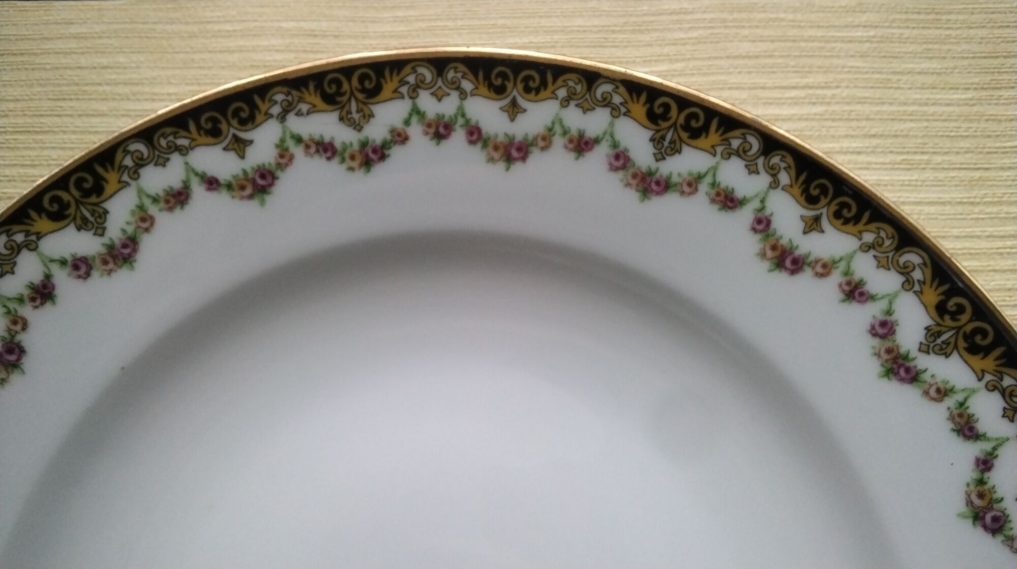 Set of 4 antique hollow plates in Limoges ULM porcelain