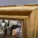 Antique gilded fireplace mirror
