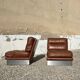 2 armchairs and 1 ottoman in brushed aluminium and brown leather, France, 1970