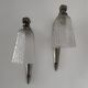 Silver Art Deco wall lights with frosted glass.
