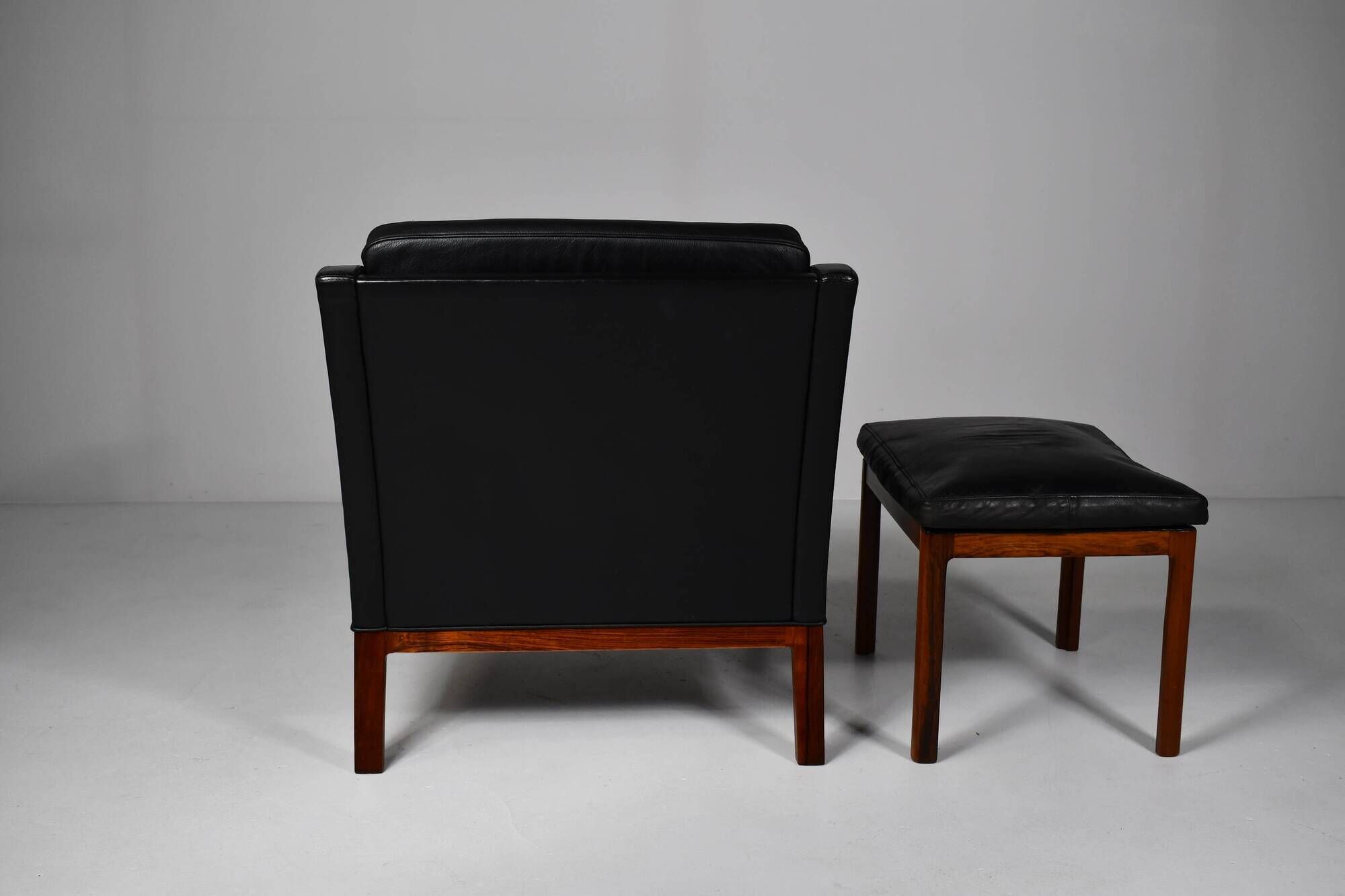 Leather armchair and footstool by Kai Lyngfeldt-Larsen. Denmark 1960s