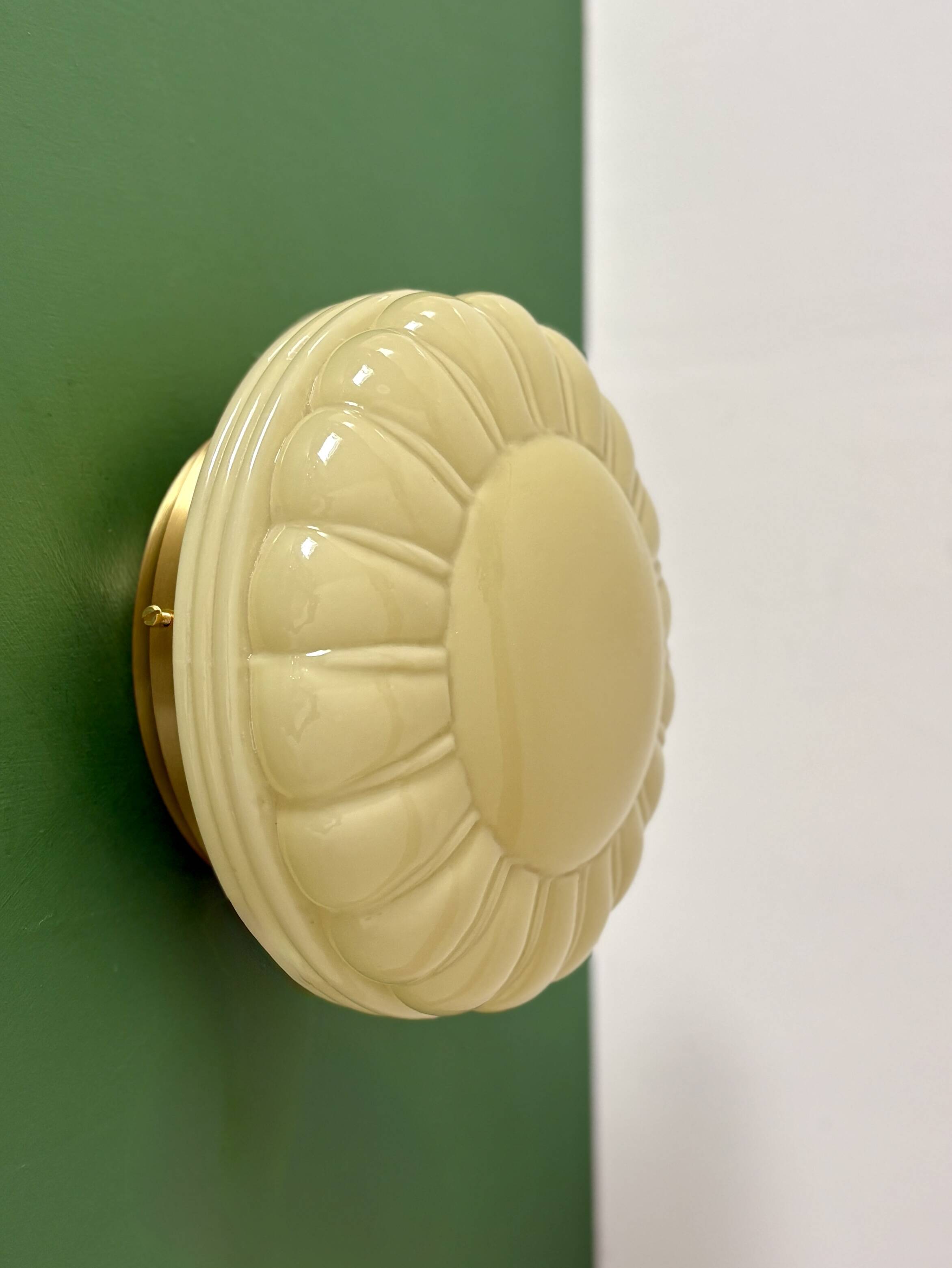 Vintage Art Deco globe wall or ceiling light in yellow opaline.