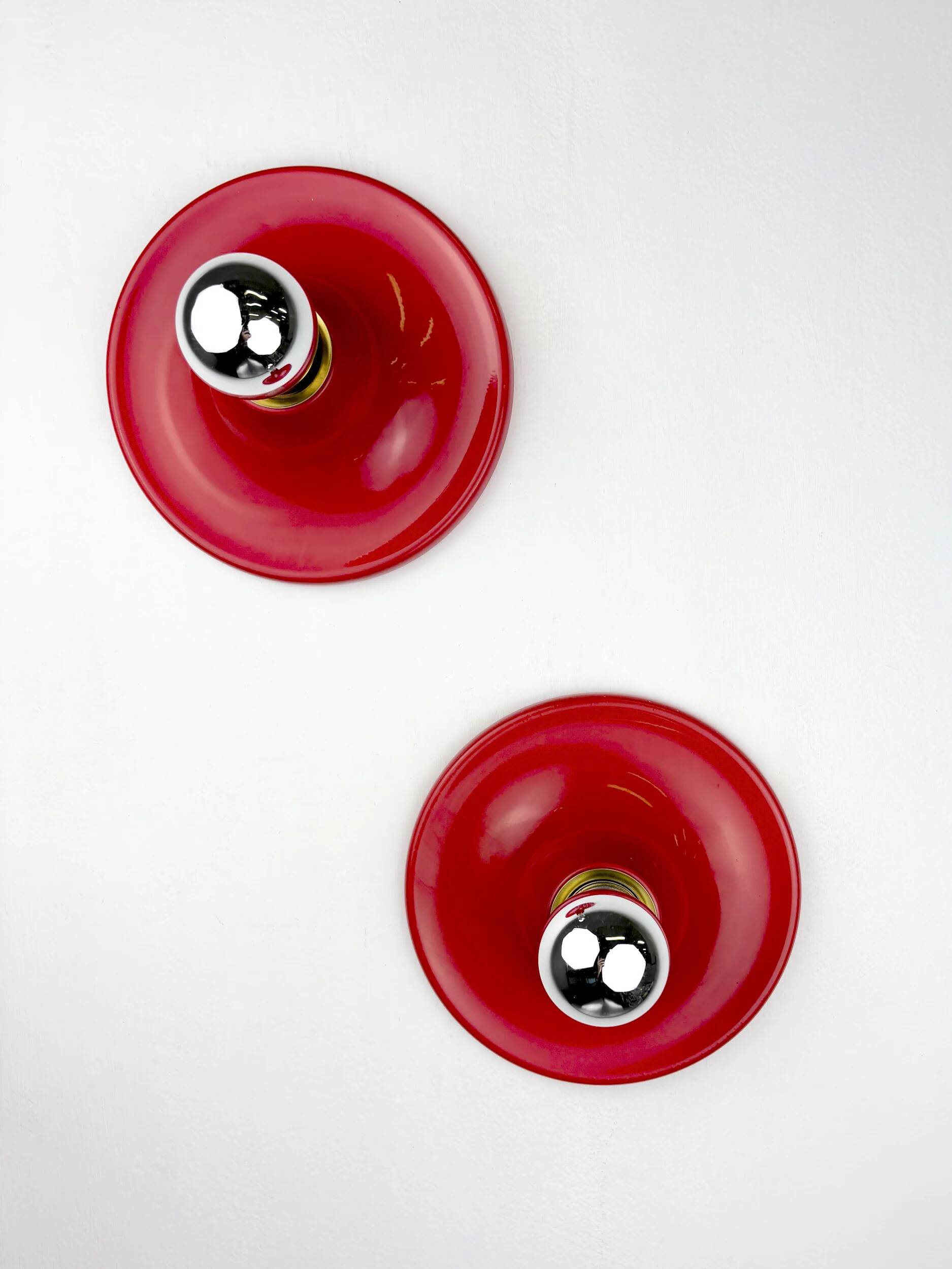 Pair of red Targetti Sankey sconces, 1970s, Italy