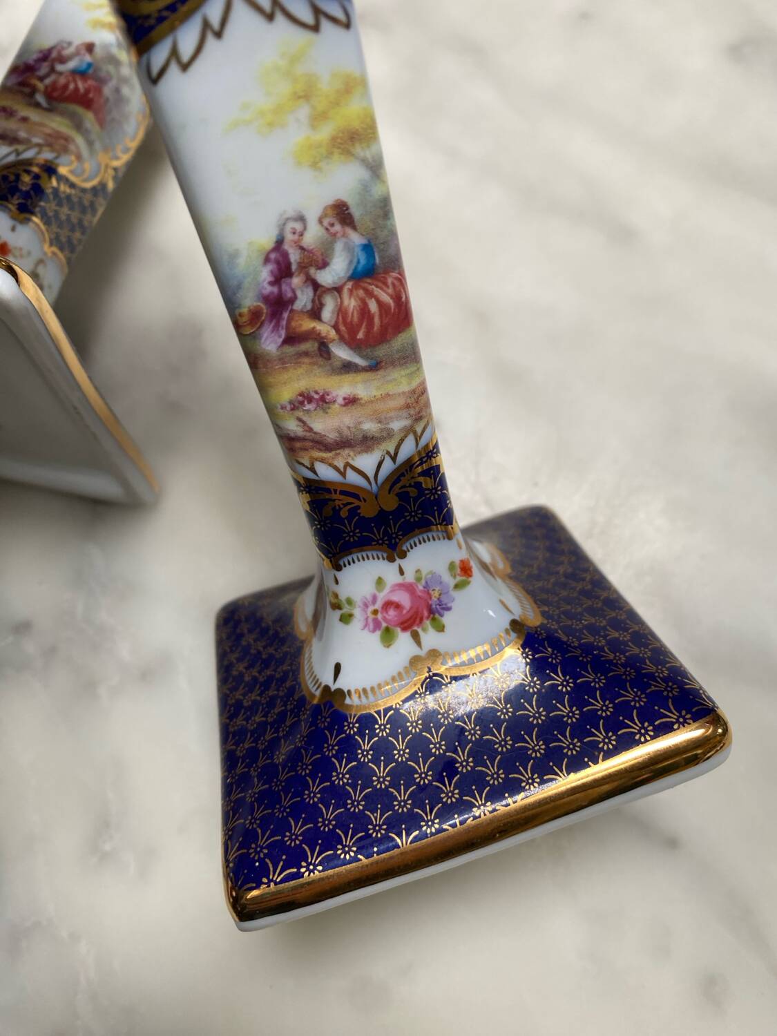 English porcelain clock and candle holders