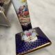 English porcelain clock and candle holders