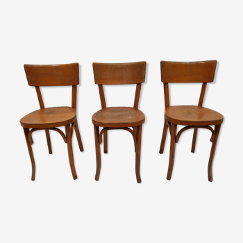 Trois chaises Baumann des années 50