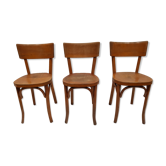 Trois chaises Baumann des années 50