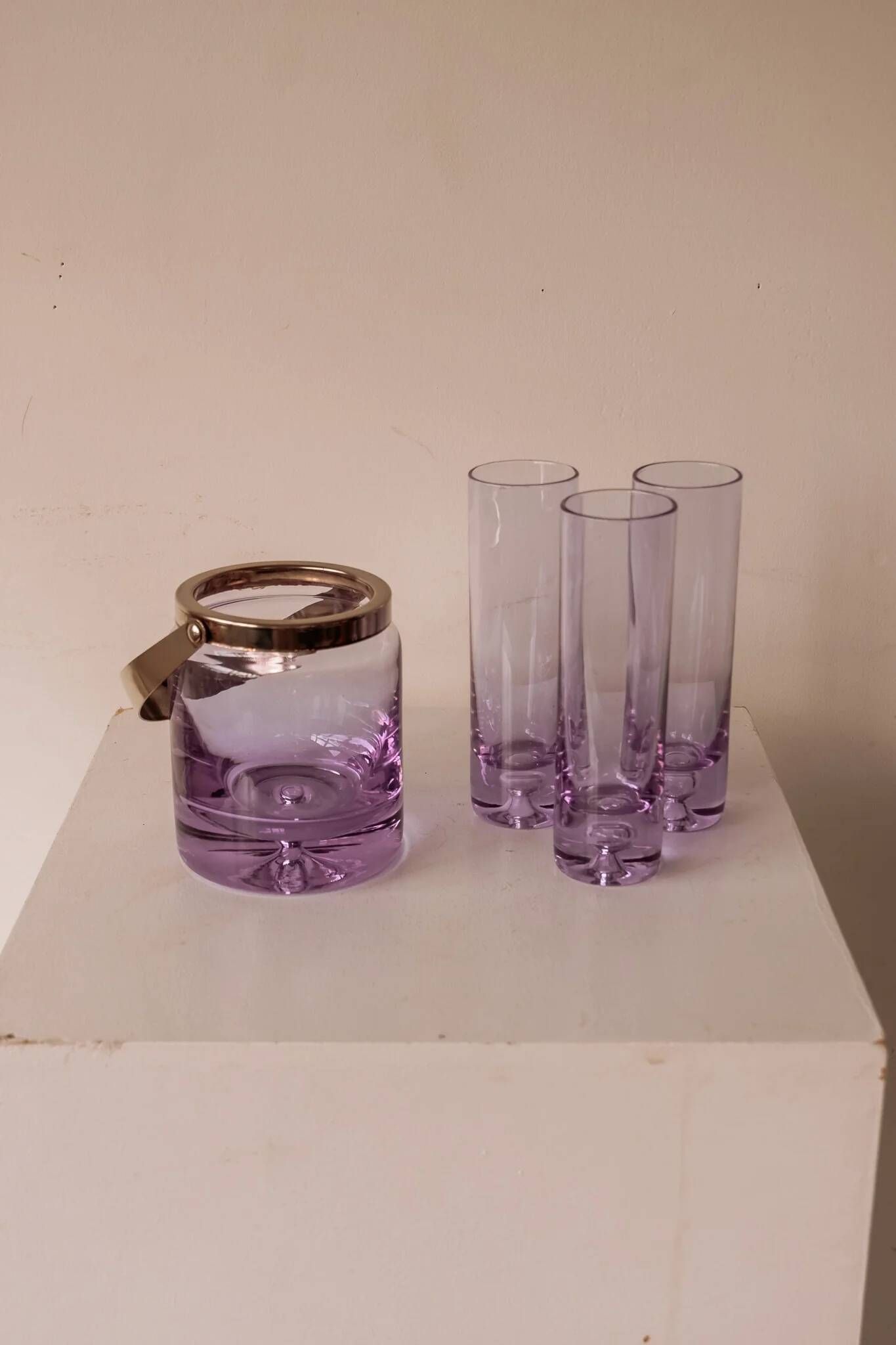Set of lilac alexandrite liqueur glasses with matching ice bucket.