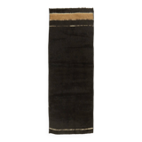 Small vintage flat-woven black rug.