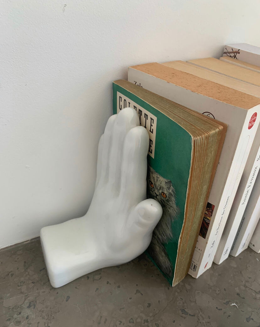 Vintage bookends in the shape of ceramic hands
