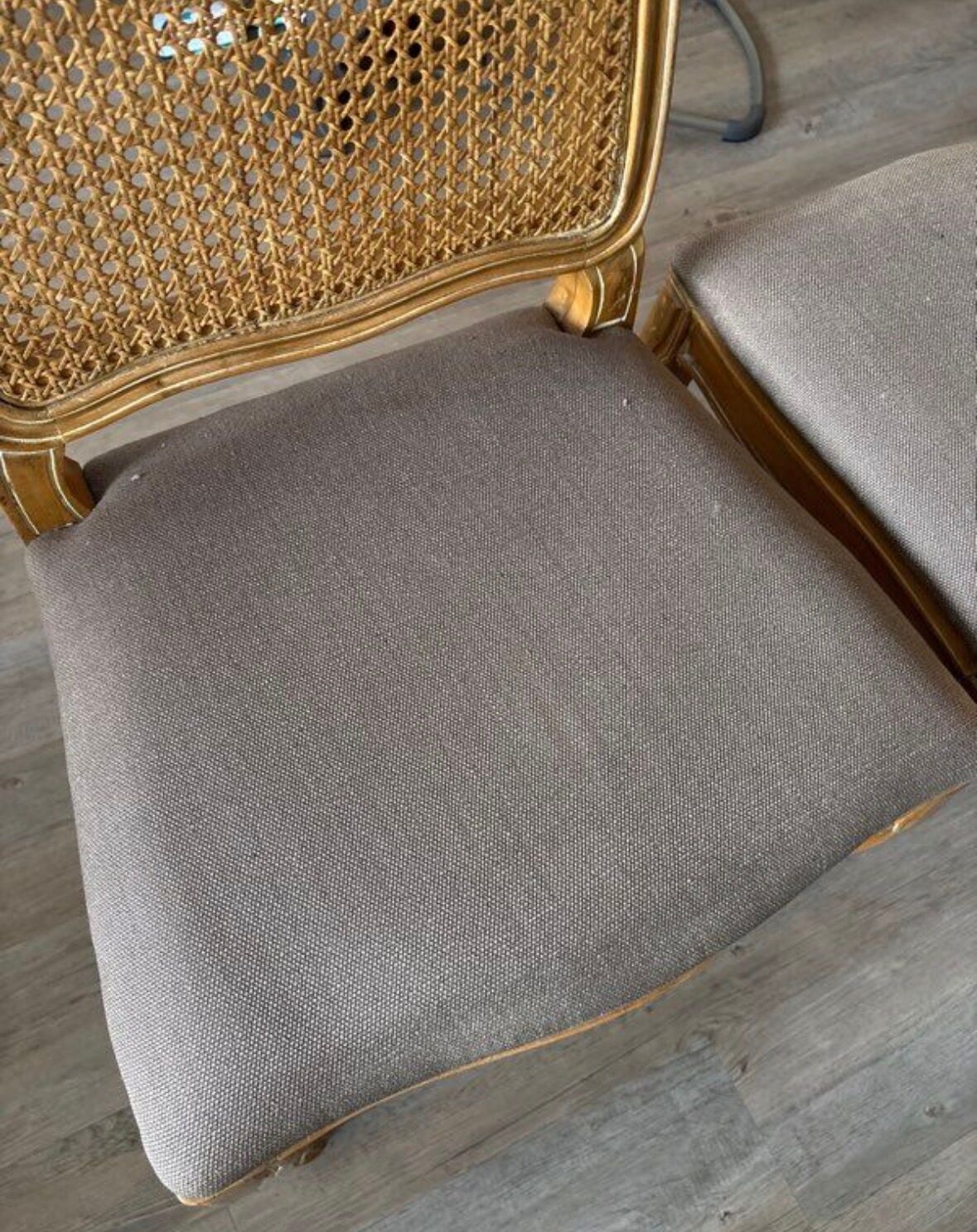 Four antique chairs in classic style with caning and upholstery.