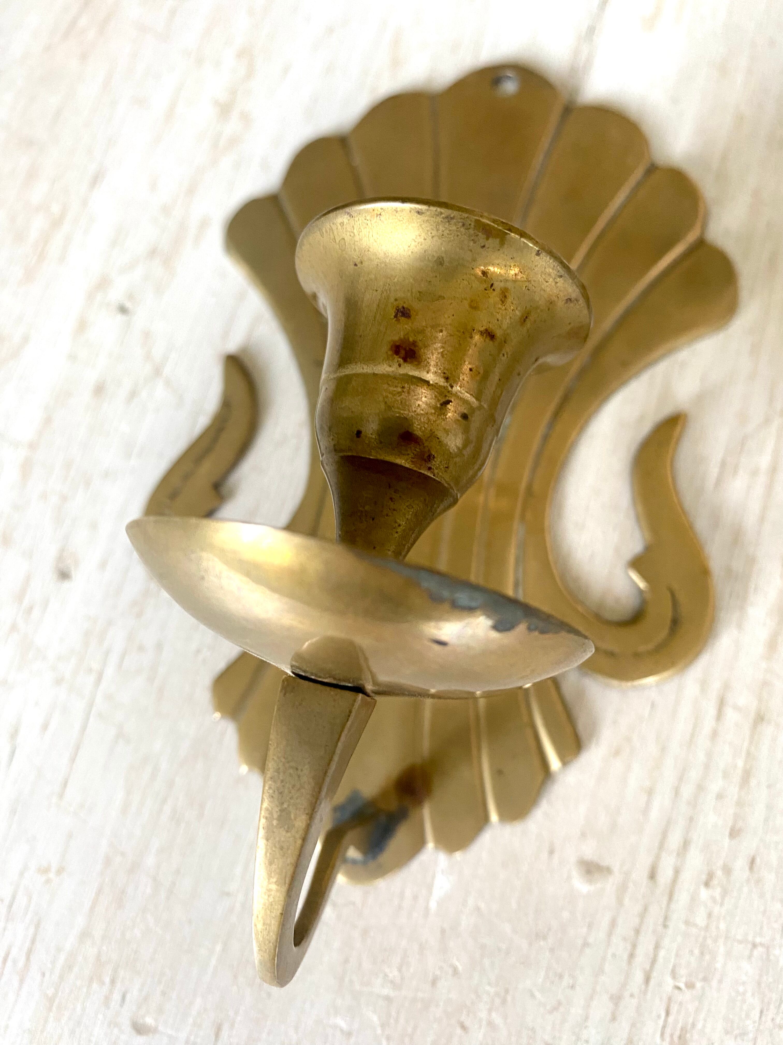 Pair of brass wall candle holders