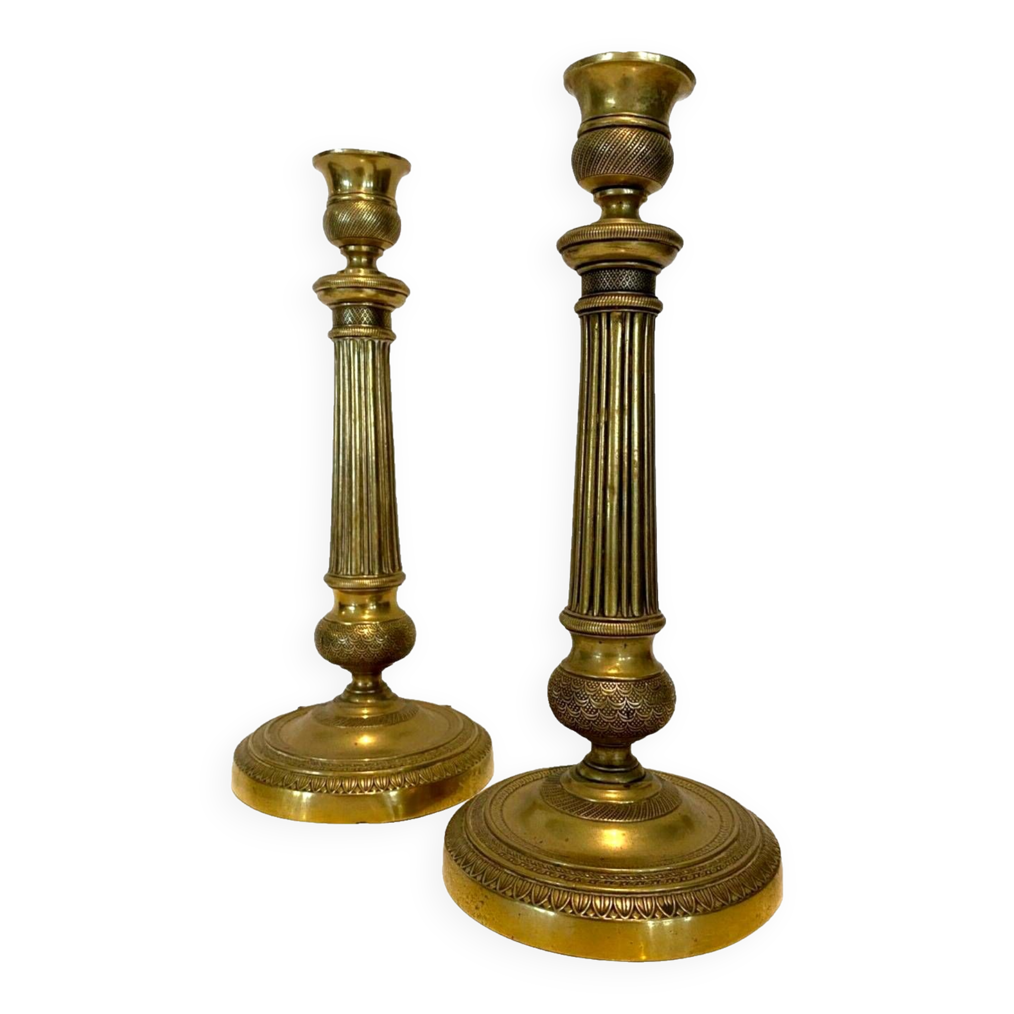 Pair of Louis XVI style candlesticks in 19th century chiseled bronze
