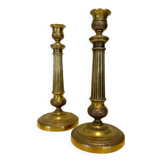 Pair of Louis XVI style candlesticks in 19th century chiseled bronze