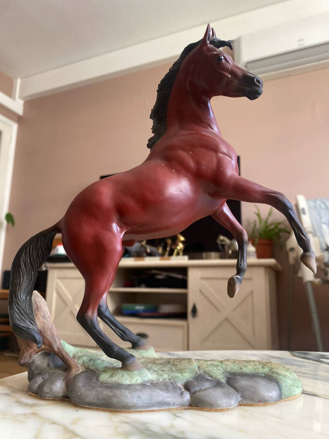Porcelain horse statue (the red pony)
