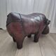 Leather rhinoceros footrest by Valenti, circa 1975.