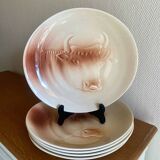 Saint Amand plates with cow head decoration.