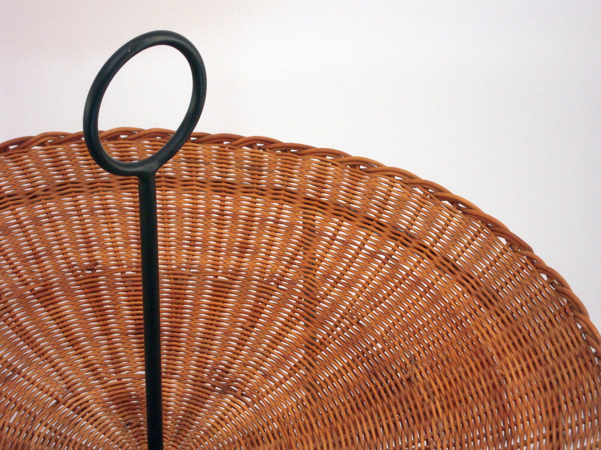 Wicker and black lacquered brass magazine rack 1960