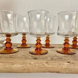 6 small amber stemmed glasses