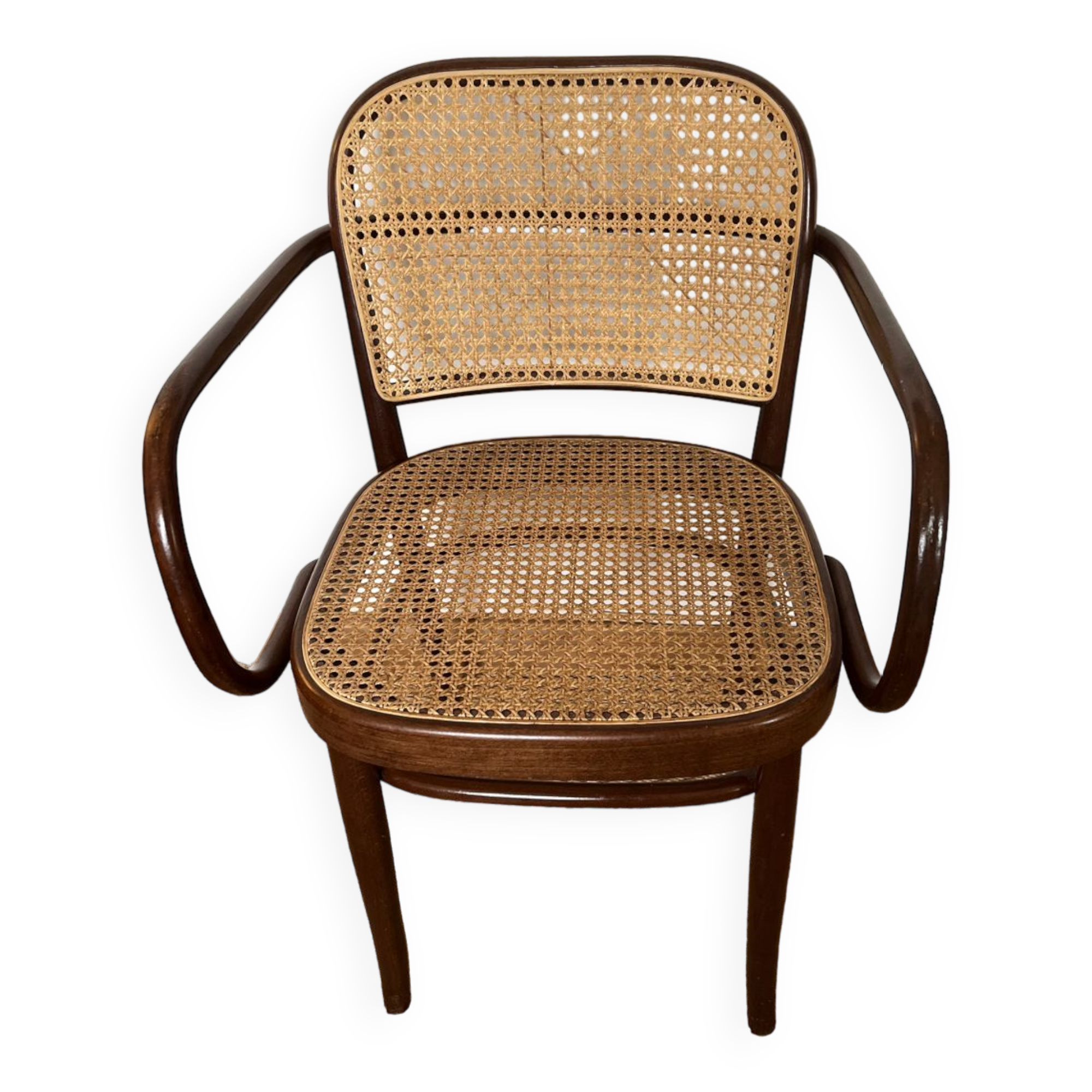 Curved wood and cane armchair