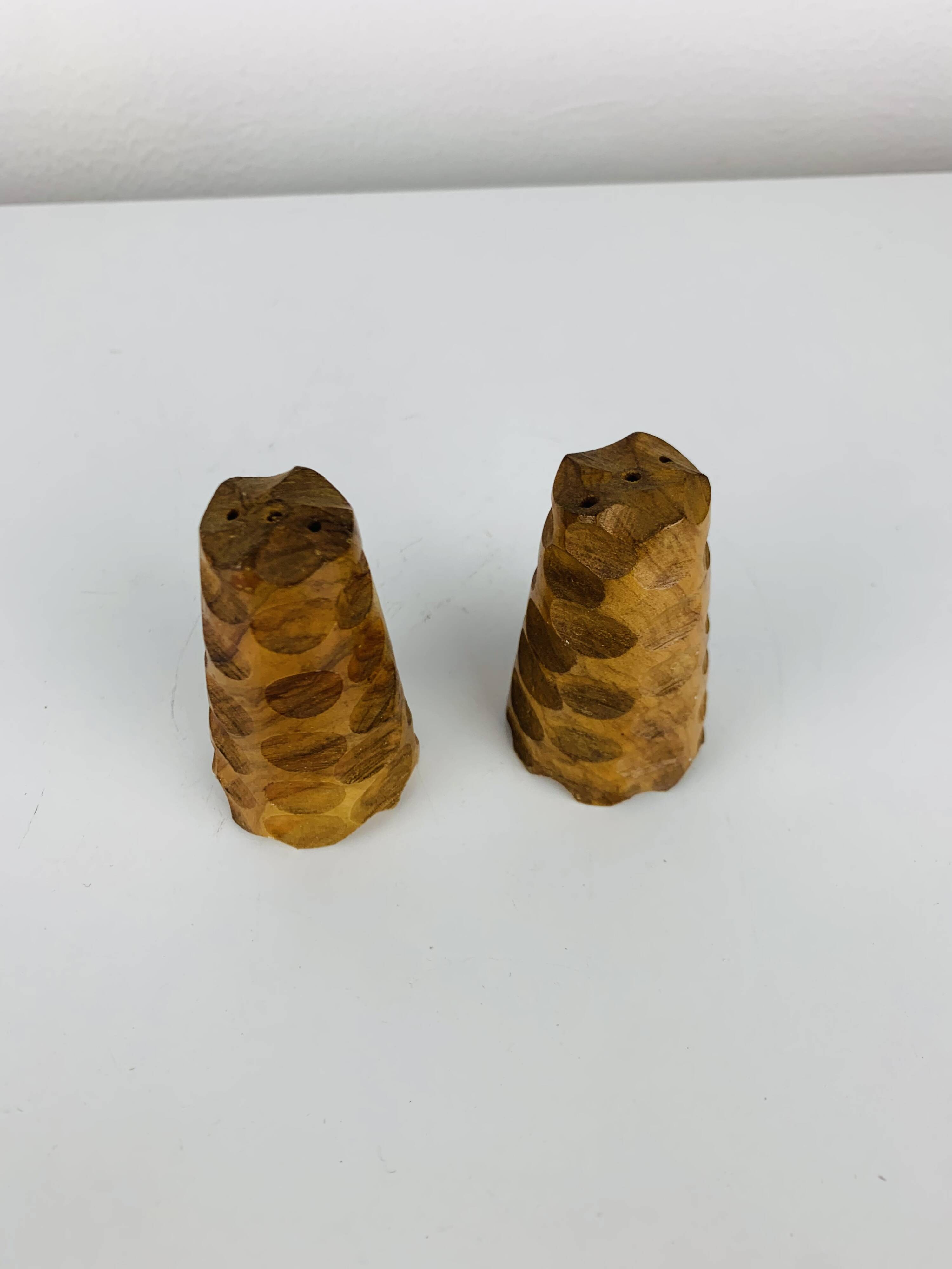 Vintage gouged olive wood salt and pepper shakers.