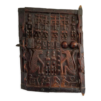 Blackened wooden Dogon attic door