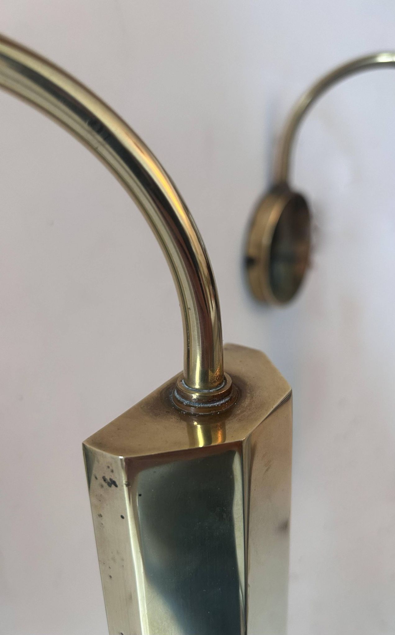 Pair of vintage adjustable wall lights, solid brass, France 1970