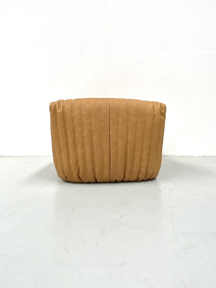 Sandra chair in camel leather by Annie Hiéronimus for Cinna/Ligne Roset.