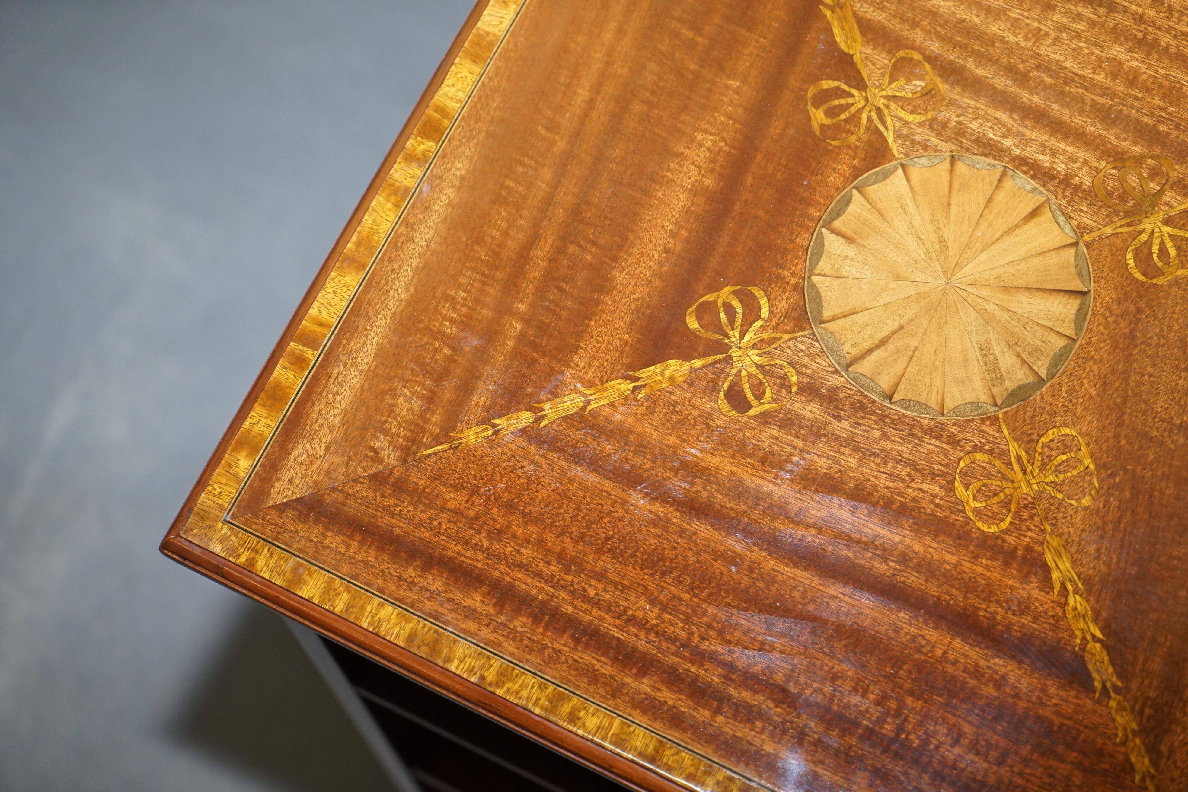 Edwardian burr walnut revolving bookcase with Sheraton inlays circa 1900