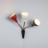 Adjustable wall lamp with three decorated shades in different colours