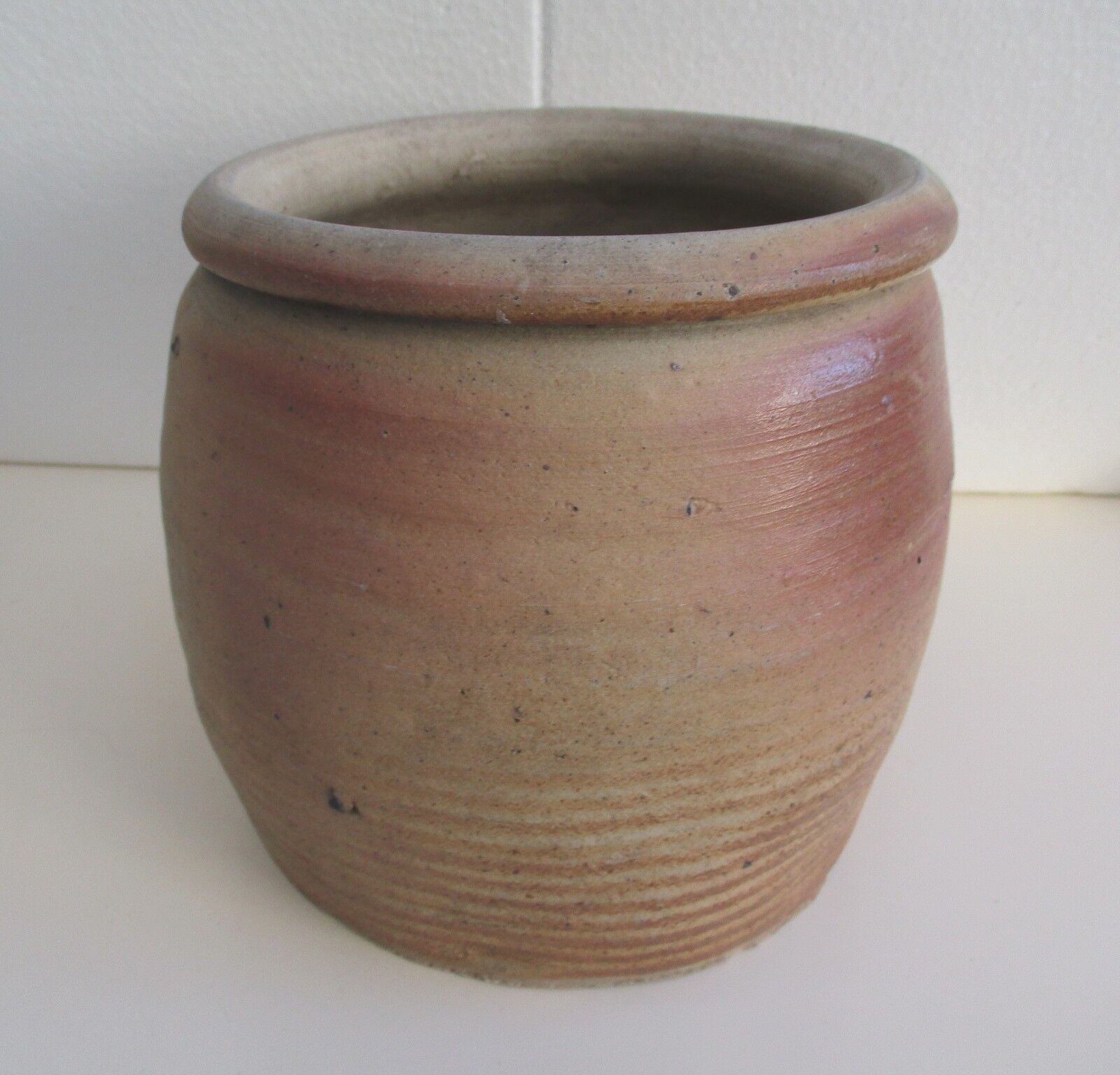 Ancient sandstone pot at one handle