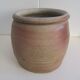 Ancient sandstone pot at one handle