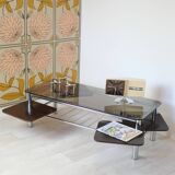 Chrome metal coffee table with smoked glass top.