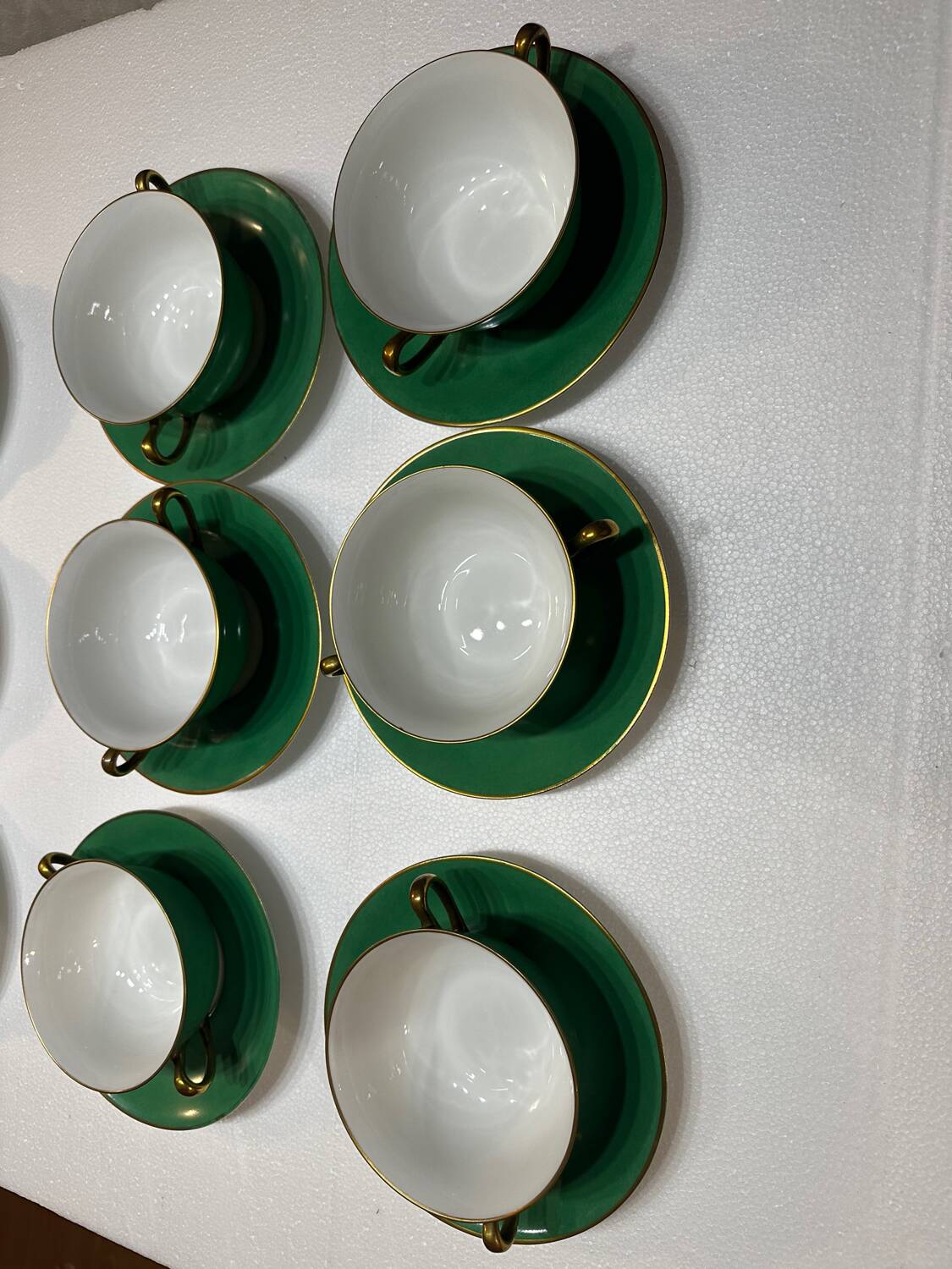 Service 14 cup and saucer in Art Deco Emerald Green and Gold.
