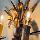 Double golden spike wall lamp