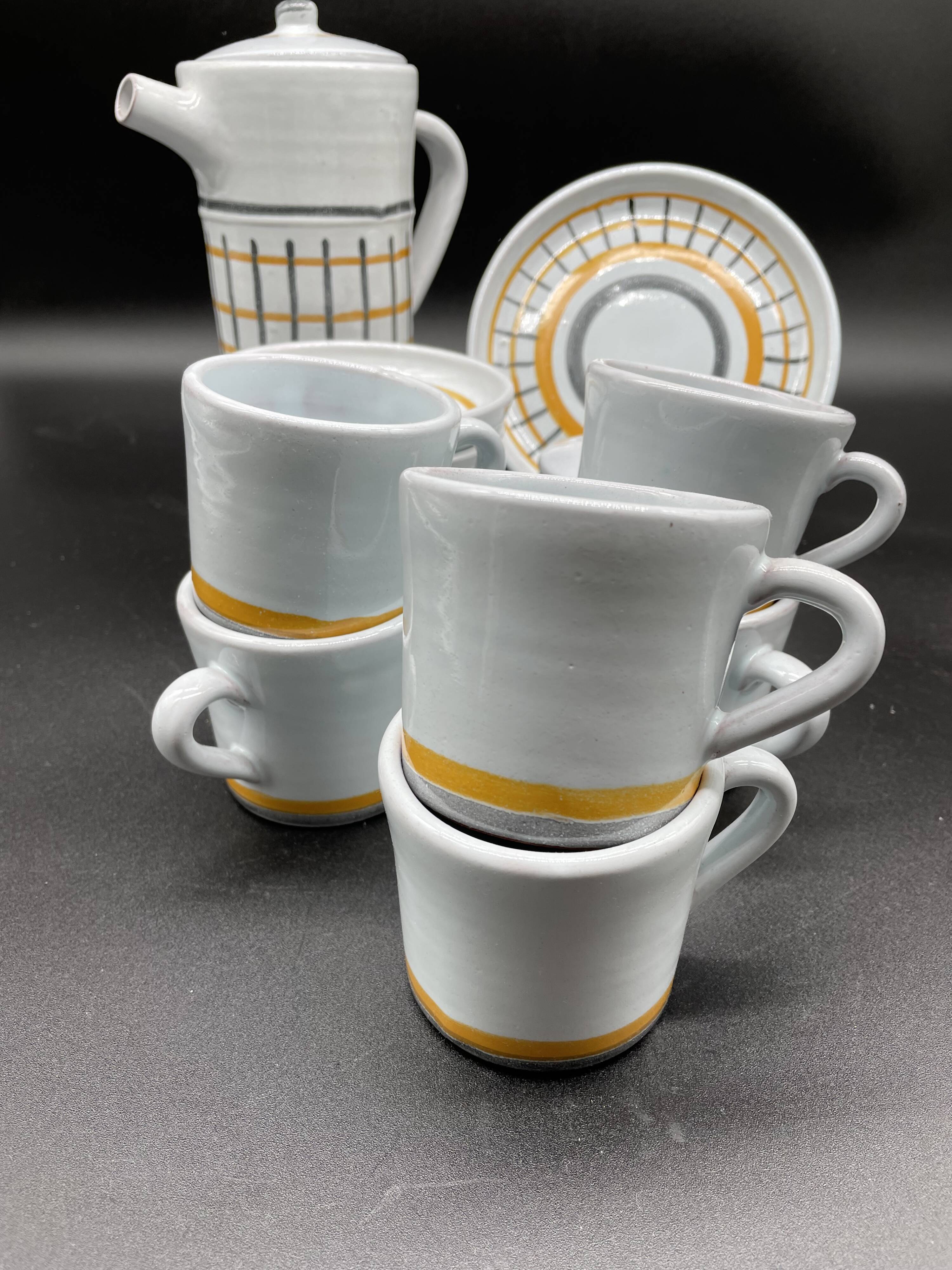 Vintage 1960s coffee service in ceramic, modernist design.