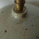 Vintage ceramic lamp with a wool shade.
