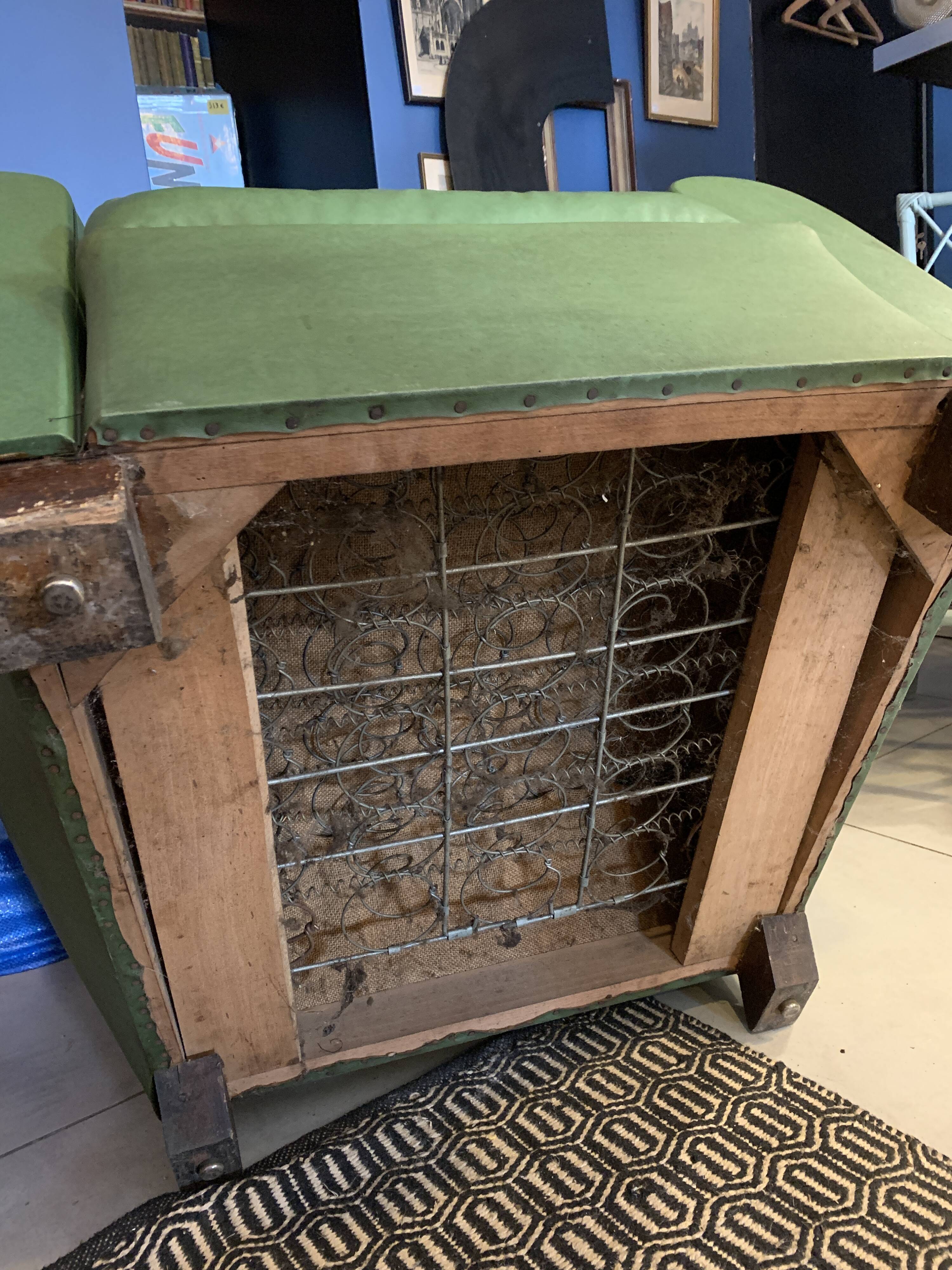 Pair of mustache club armcairs in green skai