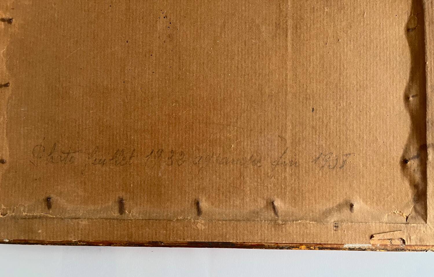 Old photo framed under glass